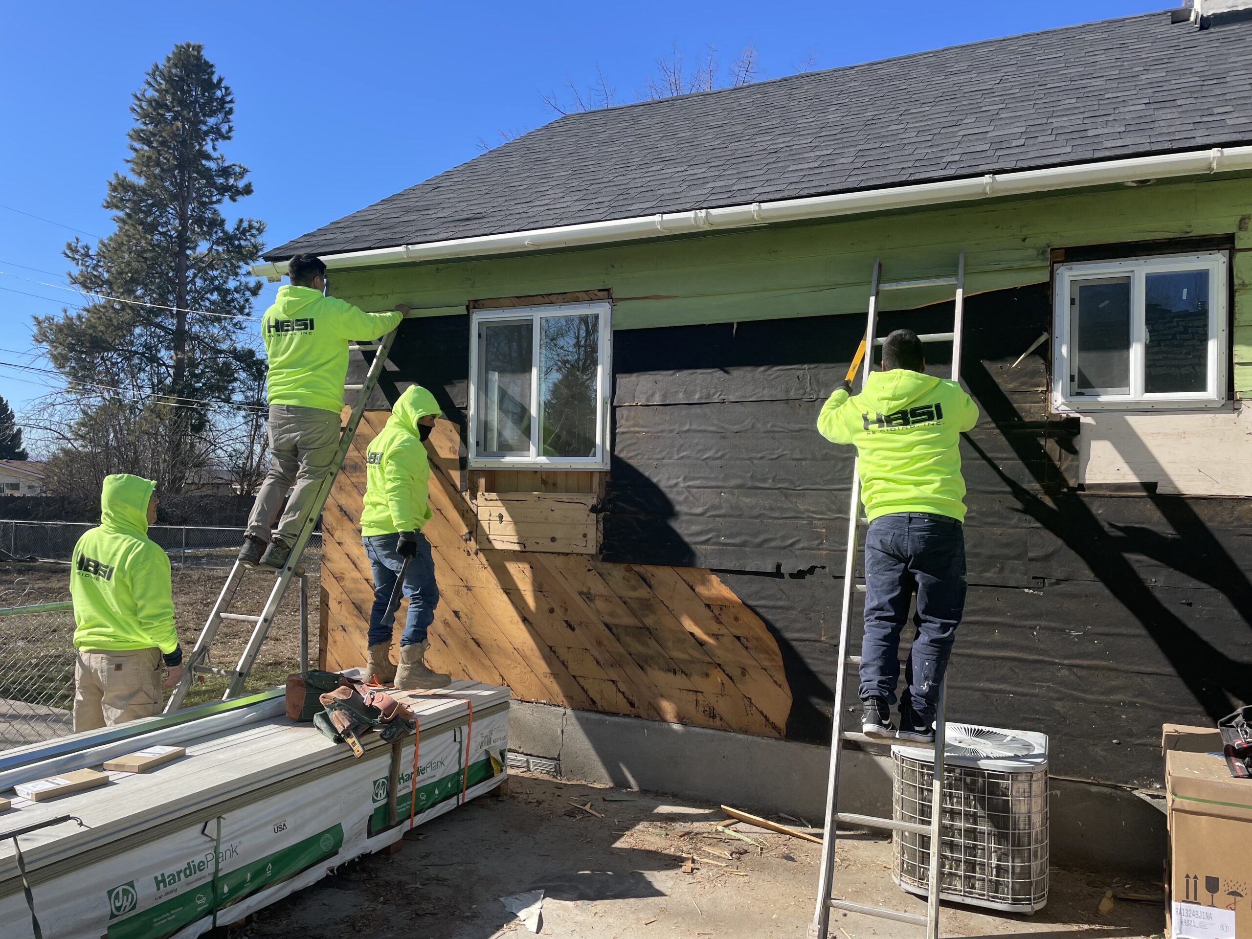 Siding removal and replacement siding installation on older house